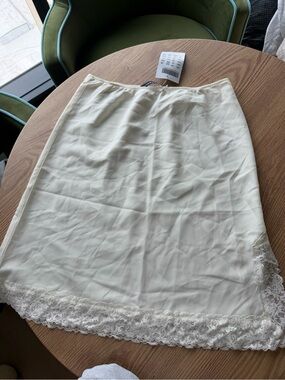 Brandy Melville Ivory Satin Half Slip with Bow Trim